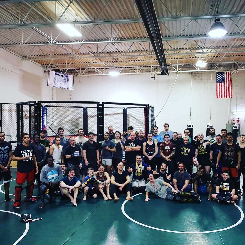 Post workout Stars and Strikes MMA family photo.